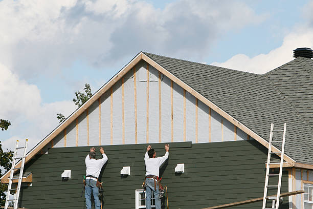 Professional Emergency Siding Repair technician working in Martinsville, OH